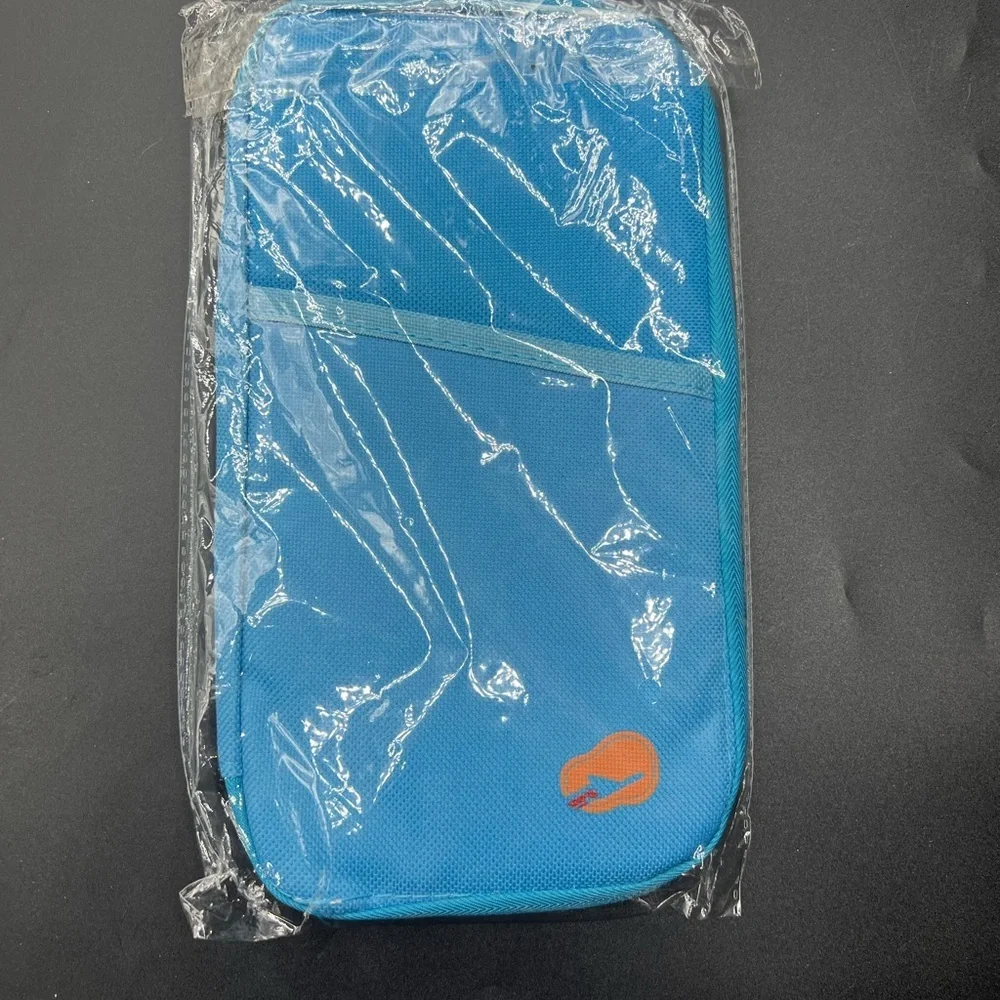 Blue Travel Organizer/ passport holder with Orange Logo